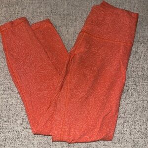 Lululemon Orange Wunder Train High-Rise Tight 25”